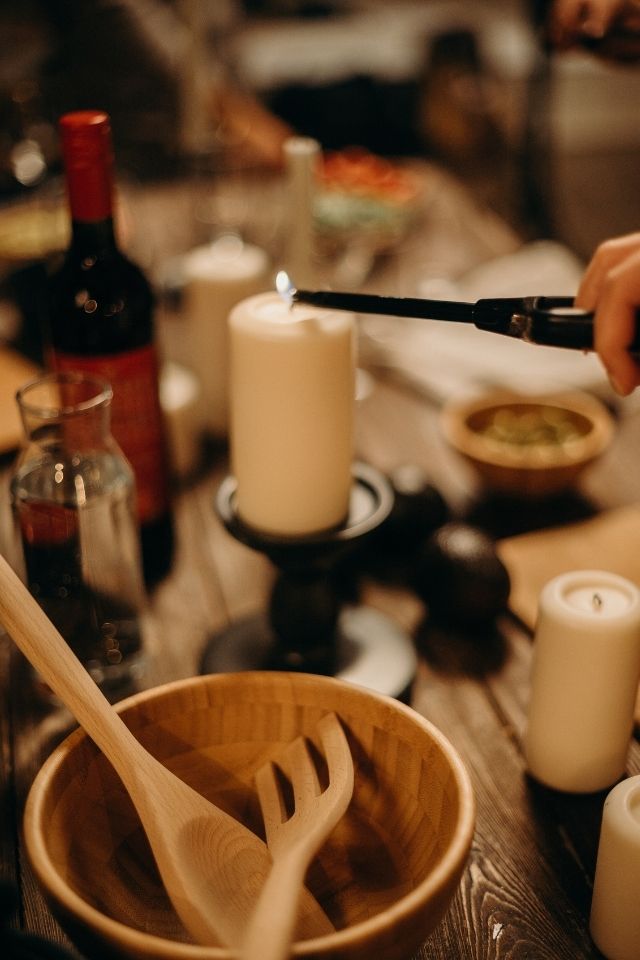 Lit candles during Thanksgiving dinner for Thanksgiving decor
